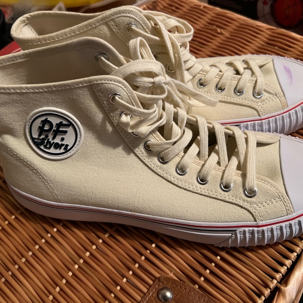 Never worn PF Flyers 
Purple smudge on toe cap that can be cleaned off.